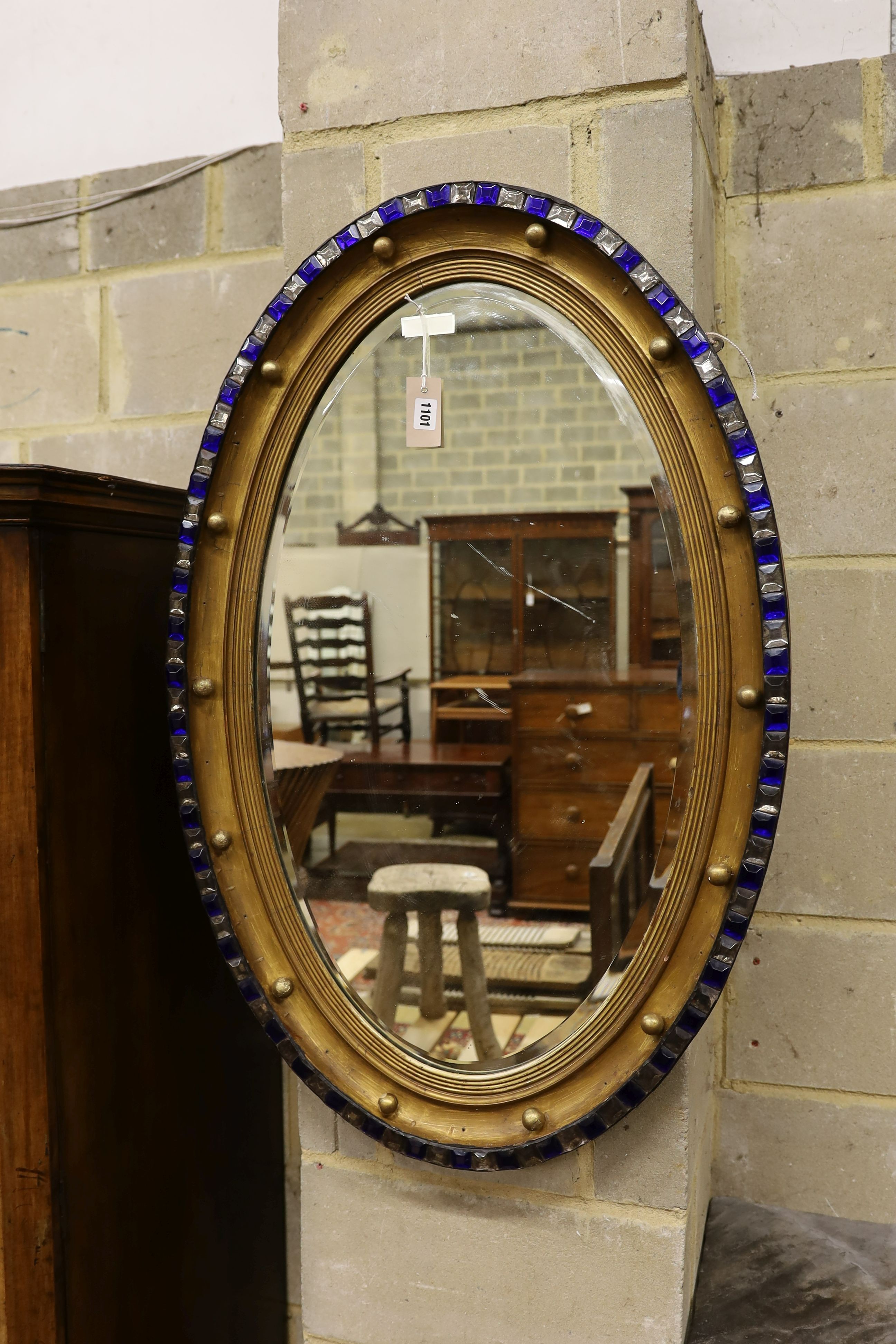 An Irish style oval wall mirror, width 64cm, height 100cm